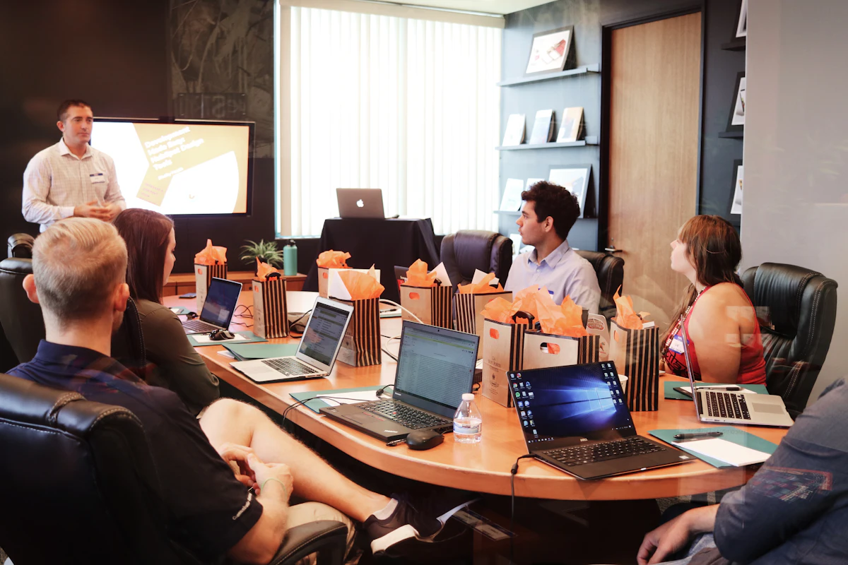 A product team reviewing feedback together in a standup.
